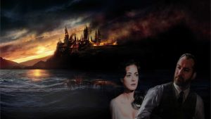 Young, dark-haired woman and middle-aged bearded man against a background of a burning castle.