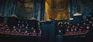Courtroom with red- and black-robed people